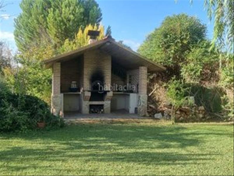 Foto 7aae8303-307e-414a-87a2-edef2b100f50. Masia amb xemeneia calefacció piscina a Colmenar de Oreja