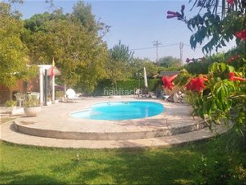 Foto 99f79c0f-25dd-407a-9493-36a7881dacdd. Masia amb xemeneia calefacció piscina a Colmenar de Oreja