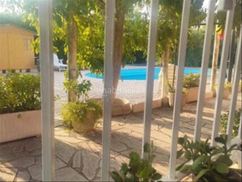 Foto ab0ca441-d251-4934-b750-2e8db9db64ac. Masia amb xemeneia calefacció piscina a Colmenar de Oreja