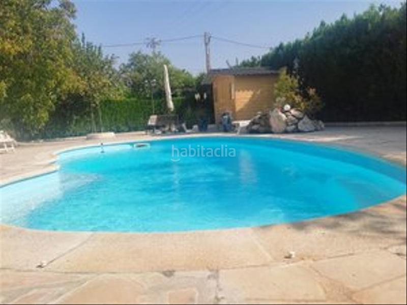 Foto e26f123c-4163-4380-ad1c-43eda382a34f. Masia amb xemeneia calefacció piscina a Colmenar de Oreja