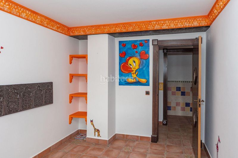 Foto ee1b1802-2825-410e-8e0c-1087711087ed. Casa adossada a Purullena