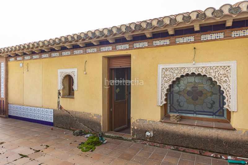 Foto f29f139f-cf04-47d2-ba1d-4bb2b9557f31. Casa adossada a Purullena