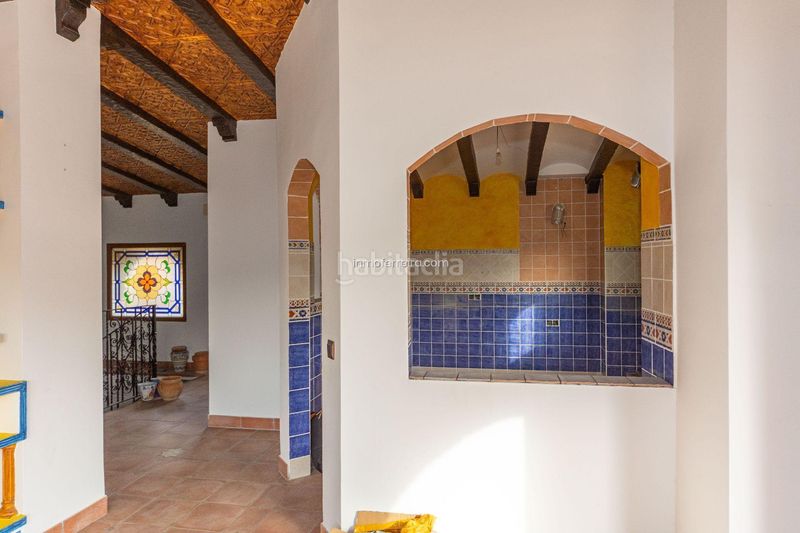 Foto f3641b74-fe2f-40cf-90b7-5b4bffee7bd3. Casa adossada a Purullena