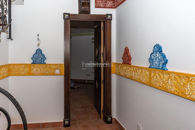 Foto fce31af9-a0b9-4251-92a9-f68656386952. Casa adossada a Purullena