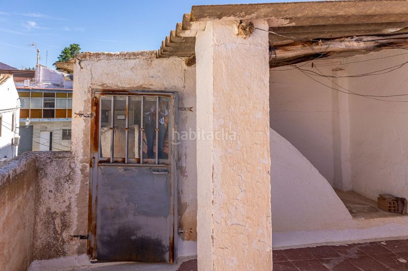 Foto 8aa16128-7582-465f-8fc1-3190a24ce290. Casa amb aparcament a Purullena