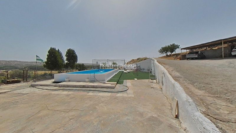 Foto e3544f8a-843c-46c0-bee6-eb5f284a62bf. Casa  cueva en Guadix