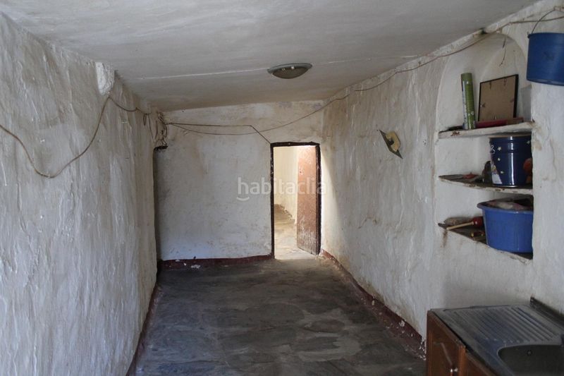 Foto cf5dc44f-d335-4b3e-b886-445f7ec9febc. Casa aparellada a Alquife