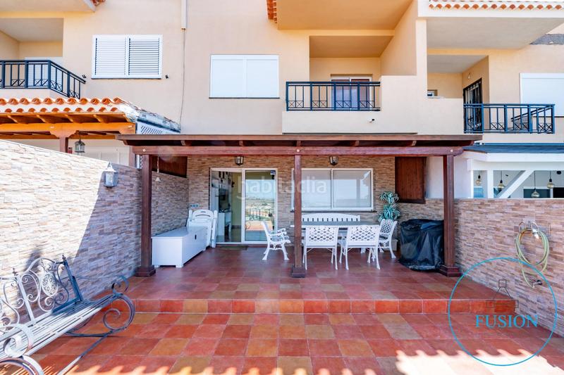Foto fa8d3b02-1540-4a1a-a924-4f84e0748fef. Casa adossada amb aparcament piscina a Torviscas Centro y Alto Adeje