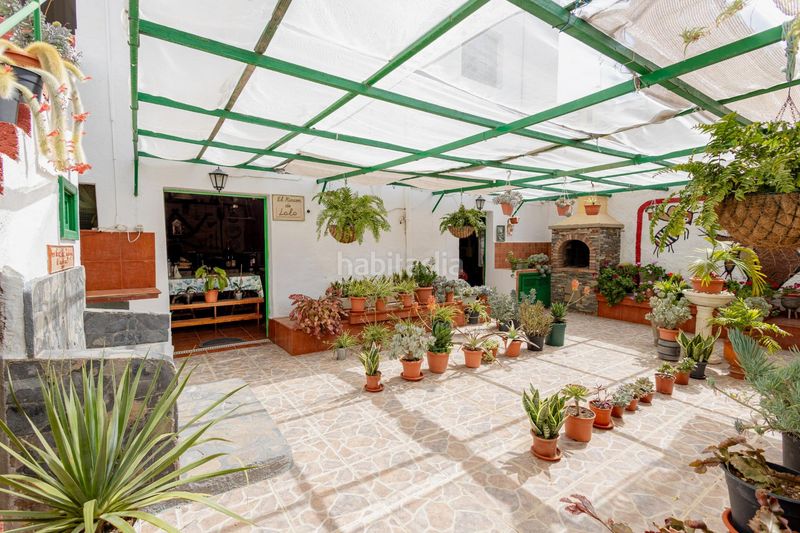 Foto 7cf06344-5f9c-417c-b5e8-ebe4d38192a8. Casa amb aparcament a Arico