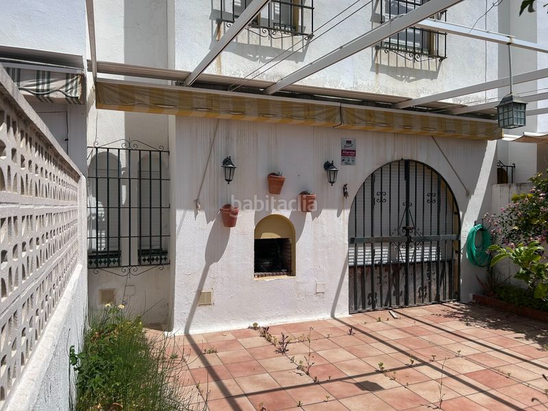 Foto 8b68bda8-bf91-405c-a019-30901b3bc2cf. Maison jumelée dans marina urbanization Casares 245 dans Casares