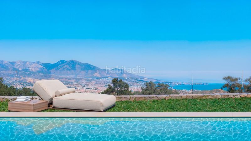 Foto c6af1db7-7ad2-42e2-a499-b1689b9ba0cd. Casa adossada amb calefacció aparcament piscina a Mijas