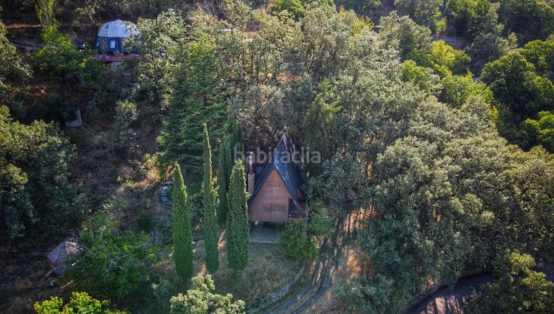 Foto 15c33f28-4b4d-4665-a441-aa117e1ca8e7. Casa  en sierra nevada con gran capacidad y potencial de rentabilidad en Güéjar Sierra