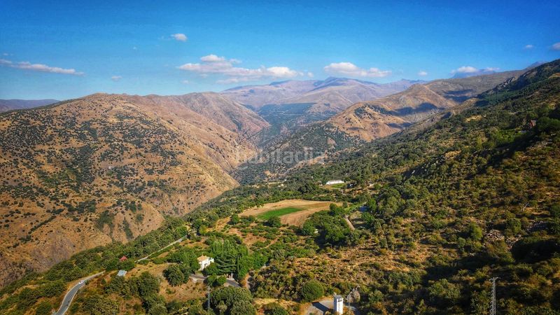 Foto 6ff30f85-462d-4202-90c6-c26d342e90b3. Casa  en sierra nevada con gran capacidad y potencial de rentabilidad en Güéjar Sierra