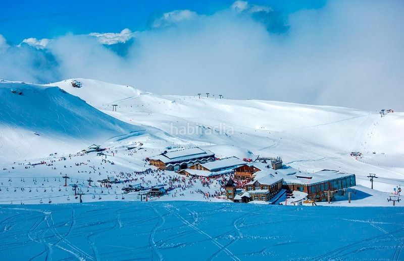 Foto e60fb32a-fed9-4fbb-adc5-dbf80f64d36e. Casa  en sierra nevada con gran capacidad y potencial de rentabilidad en Güéjar Sierra