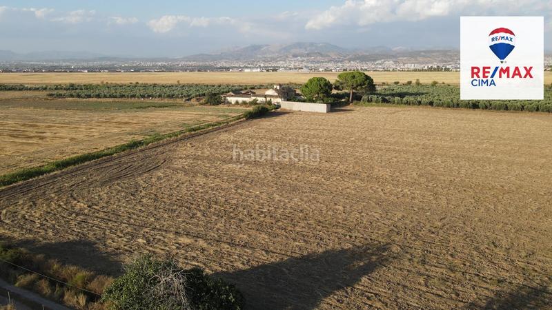 Foto e04fdb3d-4f84-45c0-b679-ff84d9466fb2. Finca rústica a extrarradio 178 a Polideportivo Alhendín