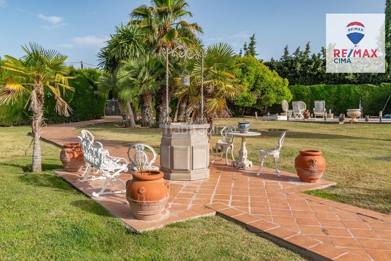 Foto 7520c87c-2628-4d97-87e1-98e36611823e. Chalet en calle urbanización los alijares 40 chalet exclusivo urbanizacion los alijares con parcela de 3.748 m2 en Otura