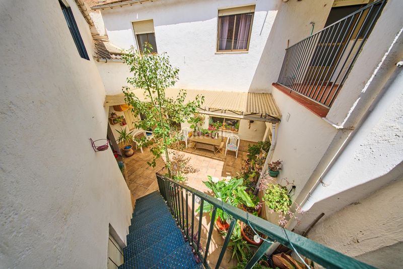 Foto 72dc75a9-bfe1-4075-a376-7653fbb97065. Casa aparellada amb aparcament a Poniente Armilla
