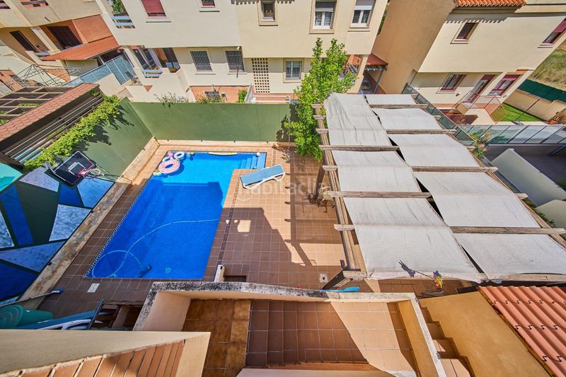 Foto 141b6c50-8d26-4fee-94da-8a34073f1bb5. Casa aparellada amb calefacció aparcament piscina a Ogíjares
