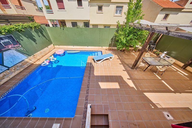 Foto f6ededad-b8c0-47bc-93c7-b33eb42e1a2e. Casa aparellada amb calefacció aparcament piscina a Ogíjares