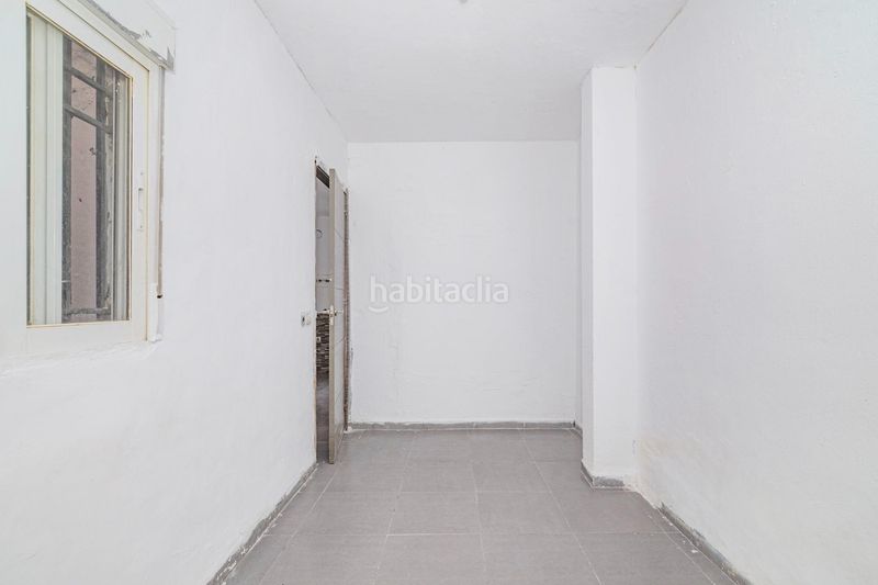 Foto 1fab9d46-f9da-40ef-a7db-8944e229ac6c. Casa aparellada a Haza Grande Granada