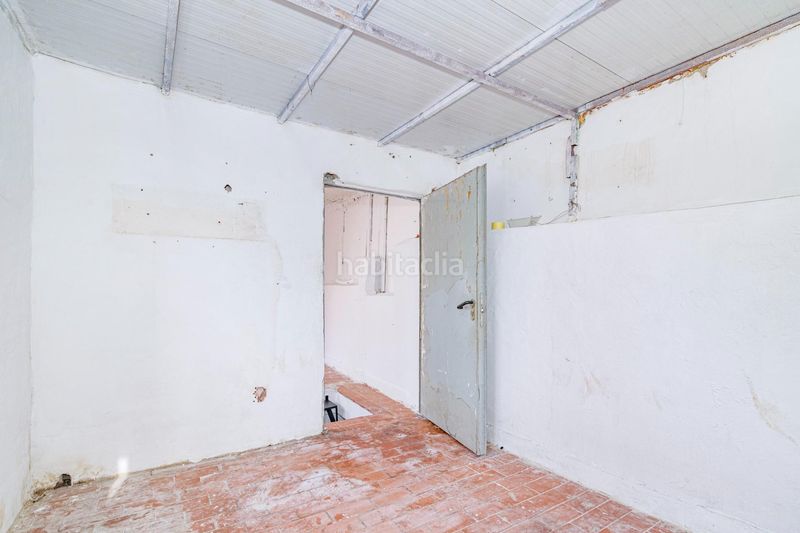Foto b17a0c30-536a-4b87-86af-96278b2d7461. Casa aparellada a Haza Grande Granada
