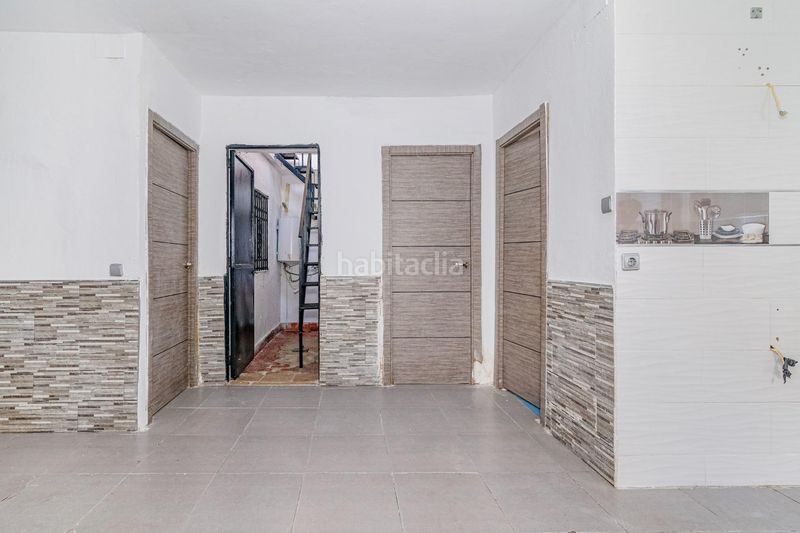 Foto bd0cceae-3eec-4ba8-b10c-fa97ef4bb373. Casa aparellada a Haza Grande Granada