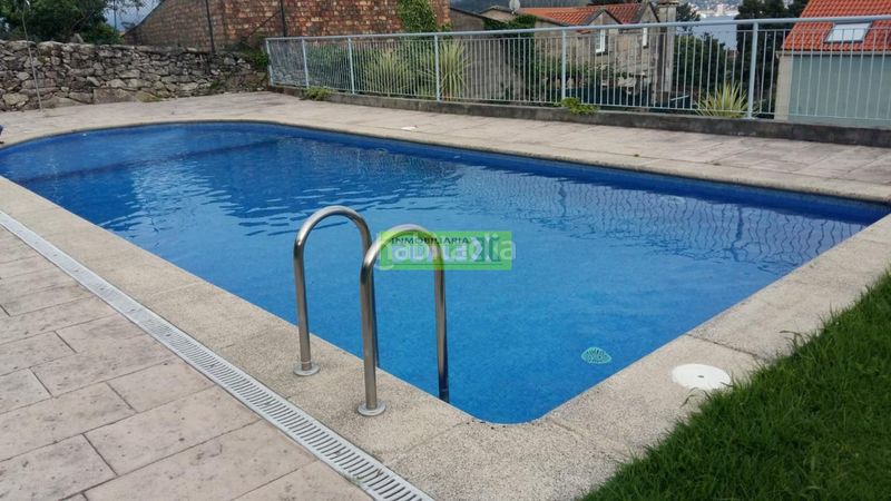 Foto 92e6fd2d-4625-4740-8d5e-e20b56664344. Lloguer àtic amb calefacció aparcament piscina a Poio