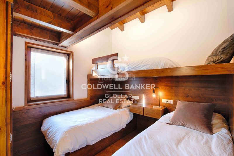 Foto 35f059d5-bbcc-46f5-90c4-fe7a2e32b7cf. Dúplex amb xemeneia calefacció aparcament a Guils de Cerdanya