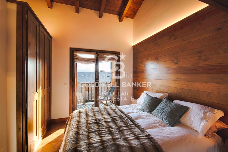 Foto 3ef99e42-b202-41d3-84a6-00c1c1c9fb9c. Dúplex amb xemeneia calefacció aparcament a Guils de Cerdanya