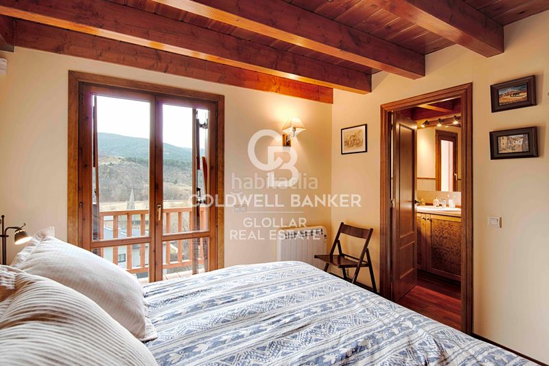 Foto 079f2e55-d266-49f8-97b0-8e5d4a68d922. Casa adossada amb xemeneia calefacció aparcament a Osseja