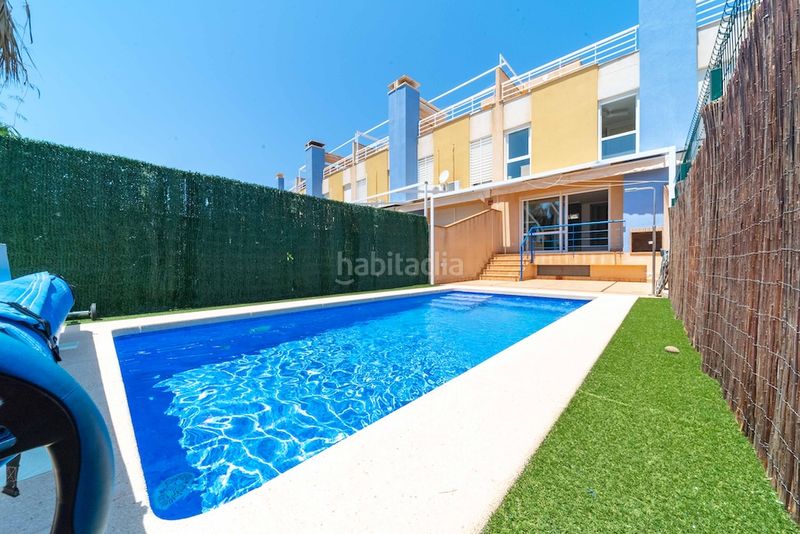 Foto d2067208-b789-4f5a-b937-94a9150201ca. Casa a schiera con parcheggio piscina in Aguamarina Orihuela