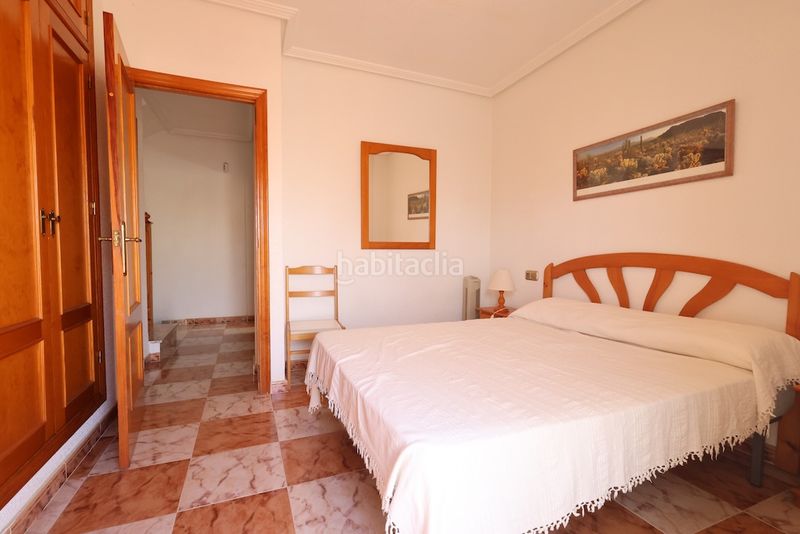 Foto 0198cc7b-d97d-4e1e-bd8a-d14685478b68. Casa a schiera con parcheggio piscina in Playa Flamenca Orihuela