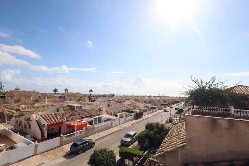 Foto 4d5fa7ec-d6e5-4f25-8db1-d33ae7c4f915. Casa a schiera con parcheggio piscina in Playa Flamenca Orihuela