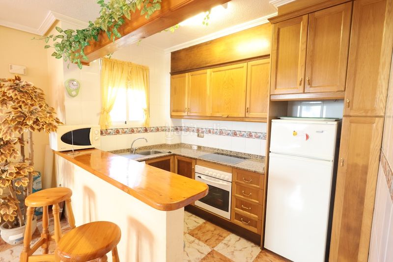 Foto b36784ea-88b0-40c1-8007-cef96f5009bb. Casa a schiera con parcheggio piscina in Playa Flamenca Orihuela