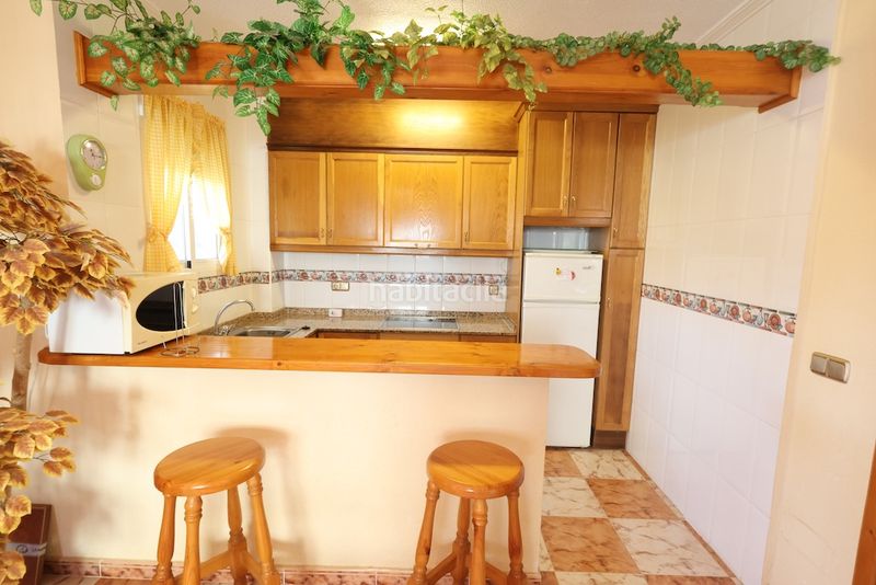 Foto ed8ee816-9a49-4905-96da-2dd7042662ce. Casa a schiera con parcheggio piscina in Playa Flamenca Orihuela