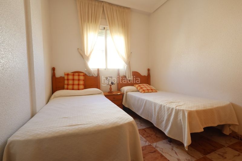 Foto f37ec9a7-91ac-4e58-8887-178153281954. Casa a schiera con parcheggio piscina in Playa Flamenca Orihuela
