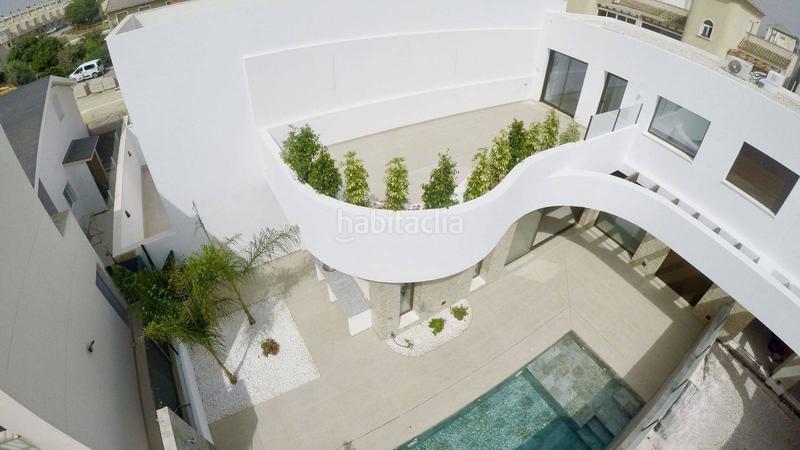 Foto 56f9936f-2269-4ea8-bc37-1f0a0b2a3dde. Chalet new build en Rojales