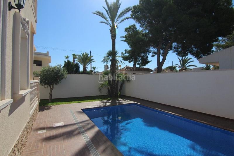 Foto b89cc185-dee4-4996-a73c-edcd90959137. Chalet villa en Cabo Roig, costa en Cabo Roig Orihuela