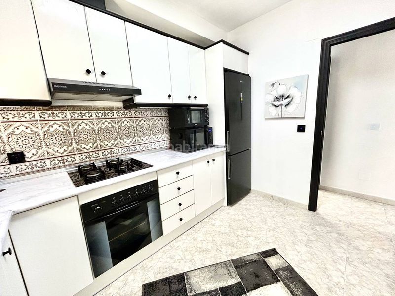 Foto c1c8d0ce-2c42-40f7-80bc-8a5d04a2da5e. Casa amb aparcament a Playa Flamenca Orihuela