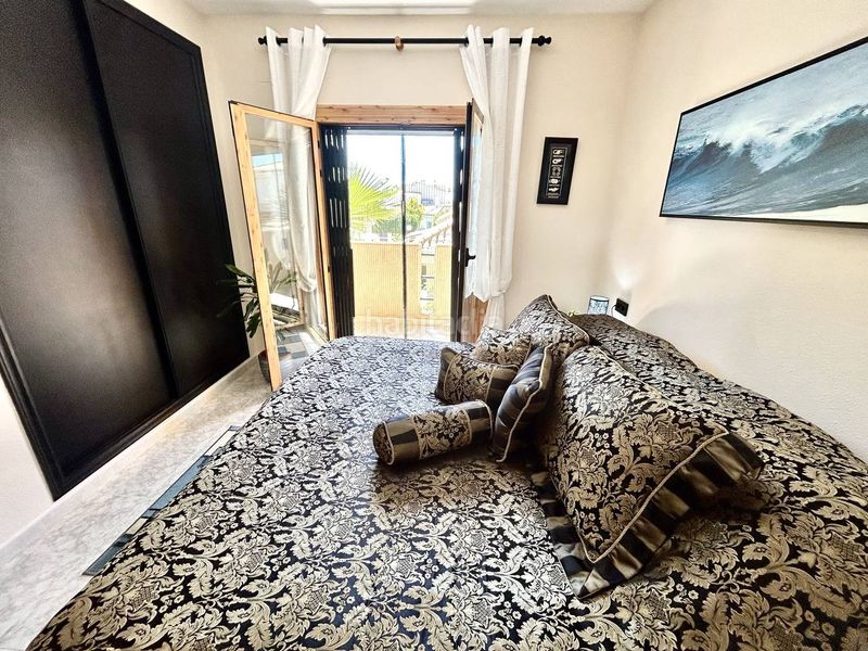 Foto c3942d4d-05b6-490e-9aba-3511ae1bfc2c. Casa amb aparcament a Playa Flamenca Orihuela