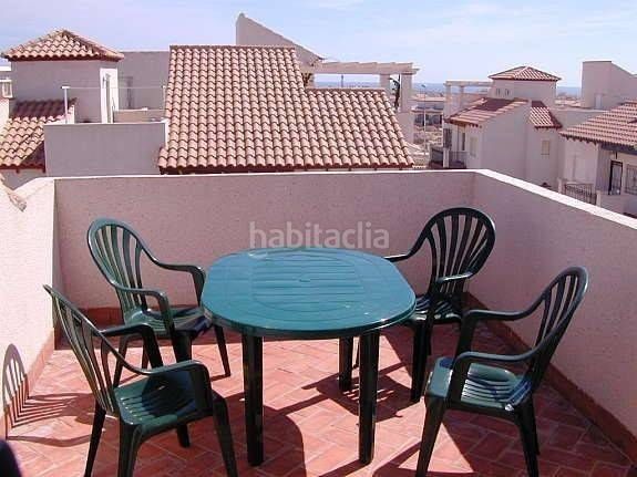 Foto ad64f837-9440-4108-aad1-428000572319. Casa amb piscina a Playa Flamenca Orihuela