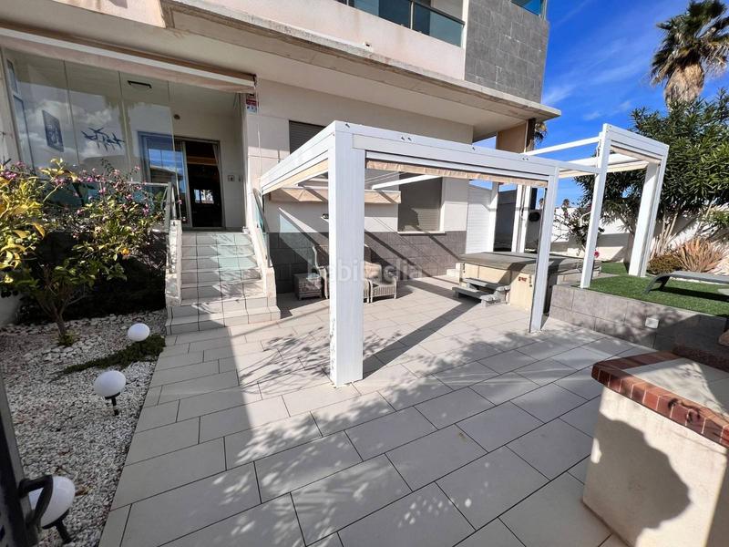 Foto a5af64bf-c684-4c43-bdc0-740026a4e585. Apartamento encantador apartamento en primera planta con patio privado y piscina comunitaria en Rojales