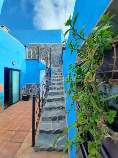 Foto 4fb711f4-dd04-4dec-8cb4-7e3be2a96467. Casa amb aparcament a Charco del Pino Granadilla de Abona