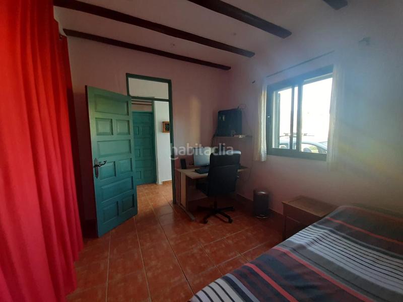 Foto 5141a9da-2945-4a5c-98e2-ce42ce1d897a. House with parking in Charco del Pino Granadilla de Abona