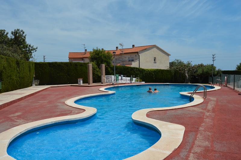 Foto 03f080e4-b924-467c-bc8b-da6de7cdb2e3. Reihenhaus mit kamin parking pool in Els Masos - Els Garrofers Coma-ruga