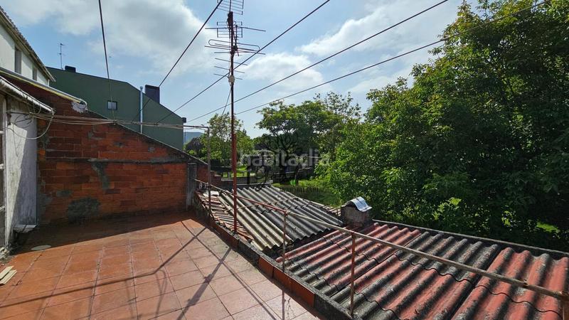 Foto 37b2f56d-0811-4934-8817-4b8d2bd7bc11. Casa adossada a A Malata - Catabois - Ciudad Jardín Ferrol
