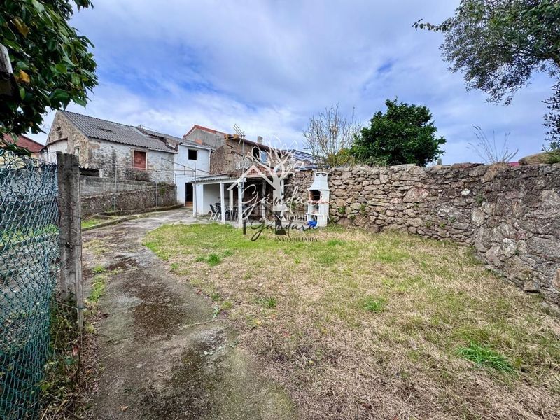 Foto aa9b633f-feef-446d-8fd0-dfc8e372e682. Casa adossada a Área Rural Ferrol