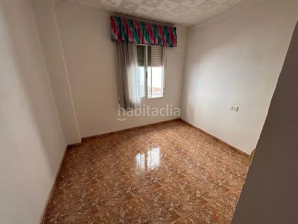 Foto 7eca7236-117a-4fbf-bc61-34a0e2580e16. Casa aparellada a Rojales