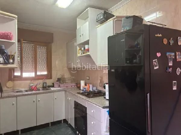 Foto 13fb9366-e7fe-4aee-b0b6-9893640b461c. Casa aparellada a Centro Rojales