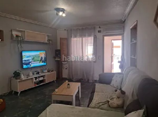 Foto cccd2421-5b67-4f61-b117-e819dfb3b05f. Casa aparellada a Centro Rojales